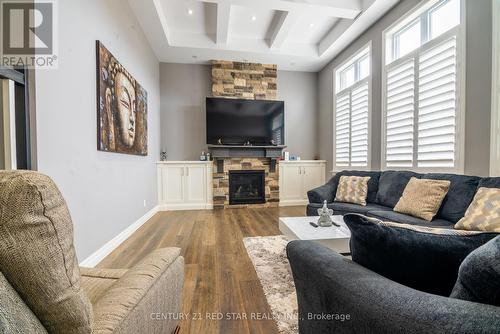 349 Munnoch Boulevard, Woodstock, ON - Indoor Photo Showing Living Room With Fireplace