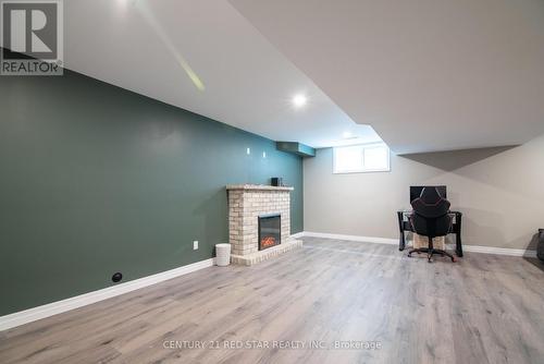 349 Munnoch Boulevard, Woodstock, ON - Indoor With Fireplace