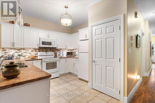 21 - 1 Rosemary Crt, Prince Edward County, ON - Indoor Photo Showing Kitchen With Double Sink