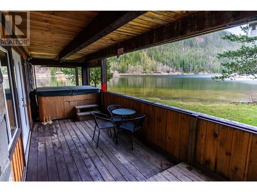 8323 Trans Canada Highway, Revelstoke, BC - Outdoor With Body Of Water With Deck Patio Veranda With Exterior