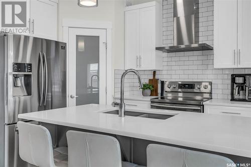221 Dubois Crescent, Saskatoon, SK - Indoor Photo Showing Kitchen With Stainless Steel Kitchen With Upgraded Kitchen