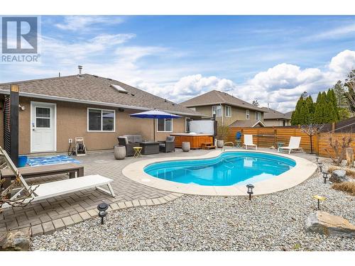 737 Cantina Court, Kelowna, BC - Outdoor With In Ground Pool With Deck Patio Veranda With Backyard