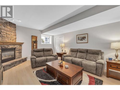 737 Cantina Court, Kelowna, BC - Indoor Photo Showing Living Room With Fireplace