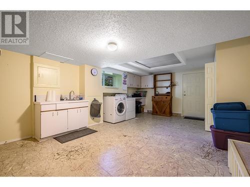15562 Old Mission Road, Lake Country, BC - Indoor Photo Showing Laundry Room