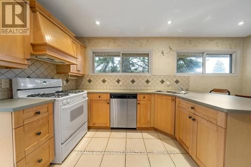 176 West 31St St, Hamilton, ON - Indoor Photo Showing Kitchen With Double Sink