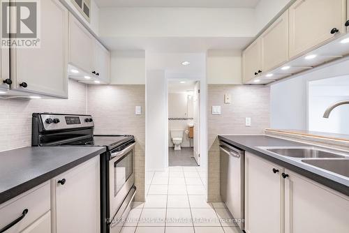 #442 -24 Southport St, Toronto, ON - Indoor Photo Showing Kitchen With Double Sink