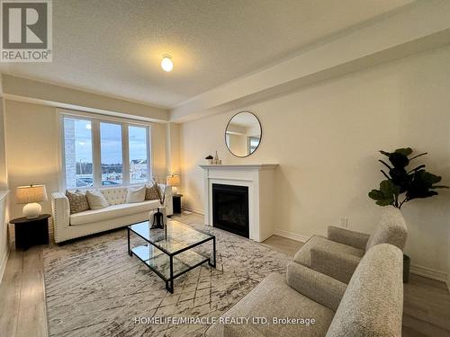 916 Bamford Terr, Peterborough, ON - Indoor Photo Showing Living Room With Fireplace