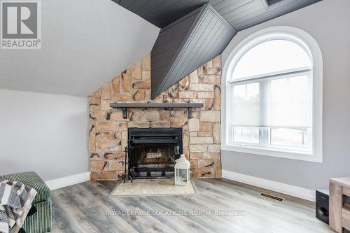 3 Matthew Crt, Wasaga Beach, ON - Indoor Photo Showing Living Room With Fireplace