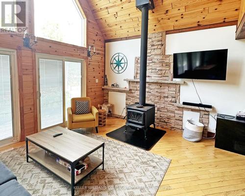 9 Philpark Rd, Tiny, ON - Indoor Photo Showing Living Room With Fireplace