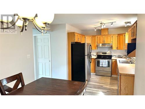 218 Waterford Avenue Unit# 107, Penticton, BC - Indoor Photo Showing Kitchen With Double Sink