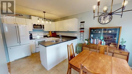 8728 81A Street, Fort St. John, BC - Indoor Photo Showing Kitchen With Double Sink