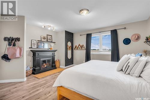 415 Kucey Crescent, Saskatoon, SK - Indoor Photo Showing Bedroom With Fireplace