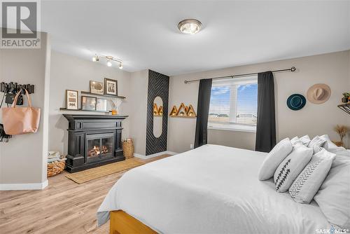 415 Kucey Crescent, Saskatoon, SK - Indoor Photo Showing Bedroom With Fireplace