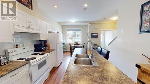 150 10904 102 Avenue, Fort St. John, BC - Indoor Photo Showing Kitchen With Double Sink