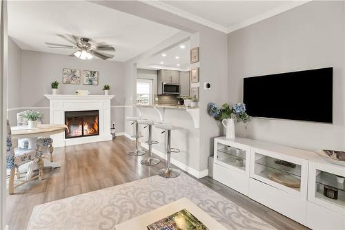 187 East 24Th Street, Hamilton, ON - Indoor Photo Showing Living Room With Fireplace