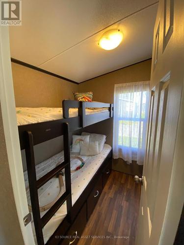 #235 -1051 Line 8 Rd, Niagara-On-The-Lake, ON - Indoor Photo Showing Bedroom