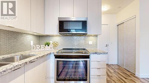 102 - 4655 Glen Erin Drive, Mississauga, ON - Indoor Photo Showing Kitchen With Upgraded Kitchen