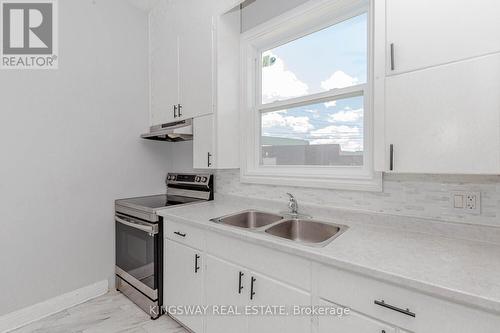 526 Beach Rd, Hamilton, ON - Indoor Photo Showing Kitchen With Double Sink