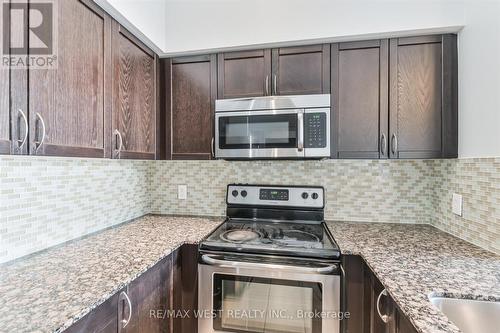 206 - 4700 Highway 7 Avenue, Vaughan, ON - Indoor Photo Showing Kitchen With Upgraded Kitchen