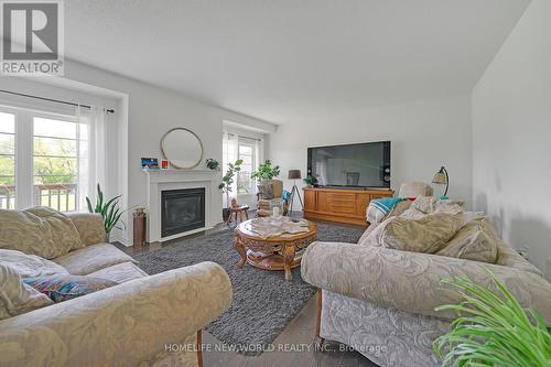 3 John Weddell Avenue, East Gwillimbury, ON - Indoor Photo Showing Living Room With Fireplace