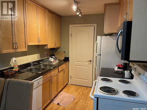 203A1 1121 Mckercher Drive, Saskatoon, SK - Indoor Photo Showing Kitchen With Double Sink