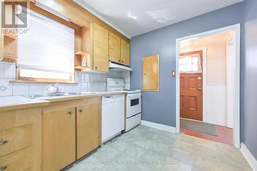 339 Cosburn Ave, Toronto, ON - Indoor Photo Showing Kitchen With Double Sink