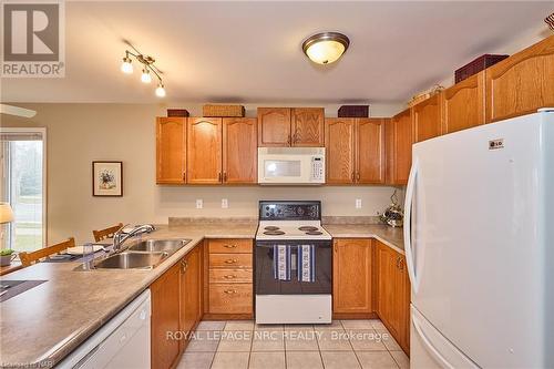 1063 Hansler Rd, Welland, ON - Indoor Photo Showing Kitchen With Double Sink