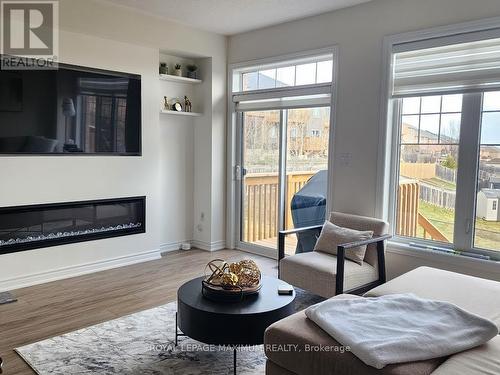 2141 Speare Crt, Innisfil, ON - Indoor Photo Showing Living Room With Fireplace