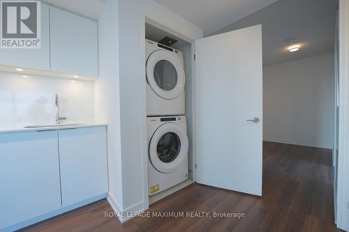 #1410 -30 Samuel Wood Way, Toronto, ON - Indoor Photo Showing Laundry Room