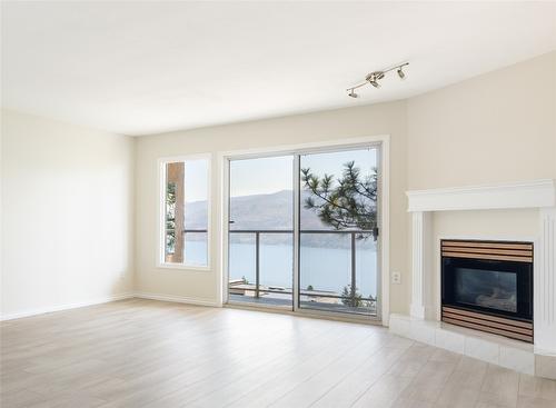 103-4630 Ponderosa Drive, Peachland, BC - Indoor Photo Showing Living Room With Fireplace