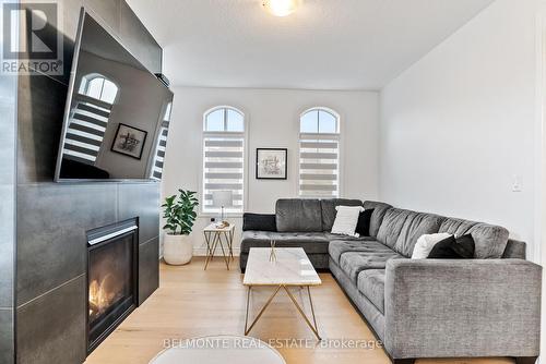 185 Douglas Kemp Cres, Clarington, ON - Indoor Photo Showing Living Room With Fireplace