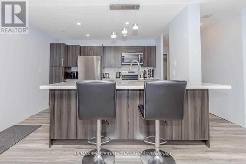#104 -4205 Shipp Dr Dr, Mississauga, ON - Indoor Photo Showing Kitchen With Stainless Steel Kitchen