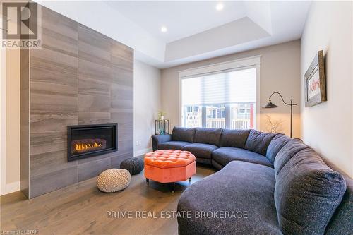 9 Sunrise Lane, Lambton Shores, ON - Indoor Photo Showing Living Room With Fireplace