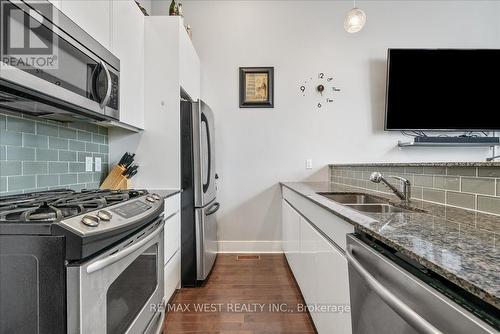 #101 -323 Kingston Rd, Toronto, ON - Indoor Photo Showing Kitchen With Stainless Steel Kitchen With Double Sink