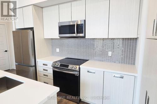 #405 -415 Sea Ray Ave, Innisfil, ON - Indoor Photo Showing Kitchen With Upgraded Kitchen