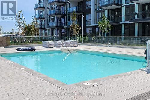 #405 -415 Sea Ray Ave, Innisfil, ON - Outdoor With In Ground Pool With Balcony