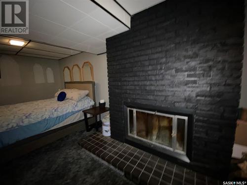 1129 Kaposvar Drive, Esterhazy, SK - Indoor Photo Showing Bedroom With Fireplace
