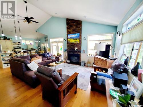 4 Cocapa Avenue, Kenosee Lake, SK - Indoor Photo Showing Living Room With Fireplace