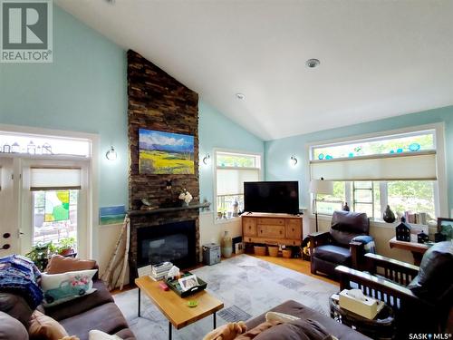 4 Cocapa Avenue, Kenosee Lake, SK - Indoor Photo Showing Living Room With Fireplace