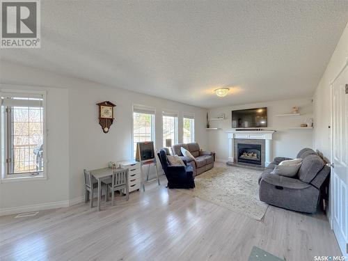 416 Mahon Drive, Prince Albert, SK - Indoor Photo Showing Living Room With Fireplace