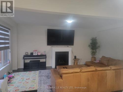 46 Wainwright Drive, Brampton, ON - Indoor With Fireplace
