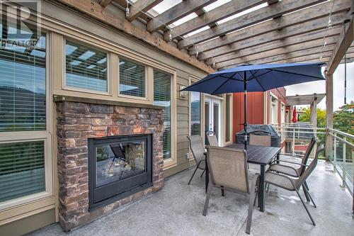 7343 Okanagan Landing Road Unit# 1305, Vernon, BC -  With Fireplace With Deck Patio Veranda With Exterior