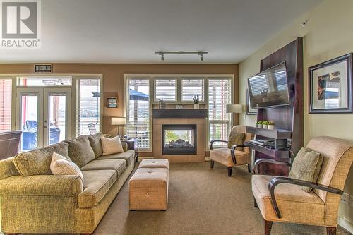 7343 Okanagan Landing Road Unit# 1305, Vernon, BC - Indoor Photo Showing Living Room With Fireplace