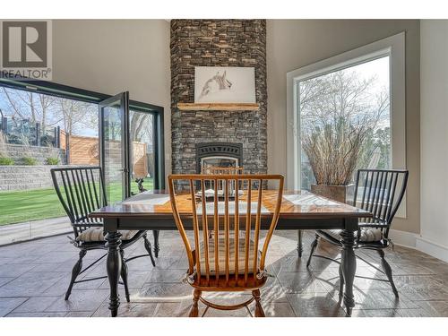 5113 Caldwell Street, Summerland, BC - Indoor Photo Showing Dining Room With Fireplace