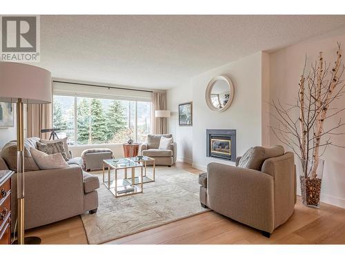 5788 L&A Road, Vernon, BC - Indoor Photo Showing Living Room With Fireplace
