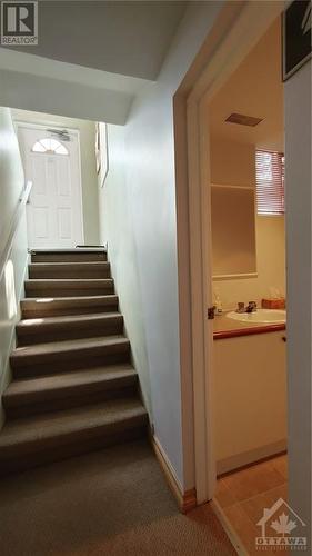 Stairs from foyer - 357 Wilmont Avenue, Ottawa, ON 