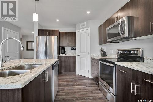 307 Labine Crescent, Saskatoon, SK - Indoor Photo Showing Kitchen With Double Sink With Upgraded Kitchen