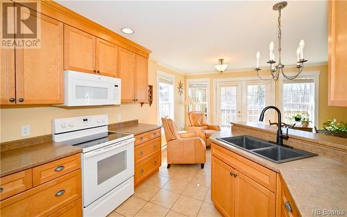 23 Riverfront Way, Fredericton, NB - Indoor Photo Showing Kitchen With Double Sink