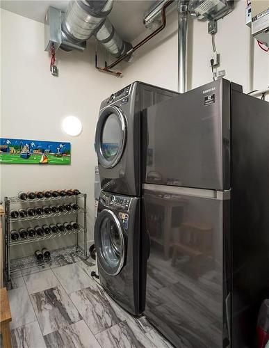 102 3400 Mcdonald Avenue, Brandon, MB - Indoor Photo Showing Laundry Room