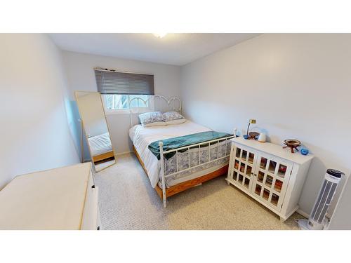 6 - 118 23Rd Avenue, Cranbrook, BC - Indoor Photo Showing Bedroom